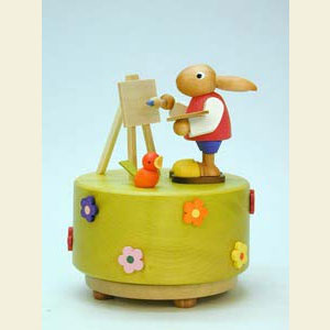 Spieldosen Diverse Motive Spieldose Osterhase an Staffelei - d 9,5 cm